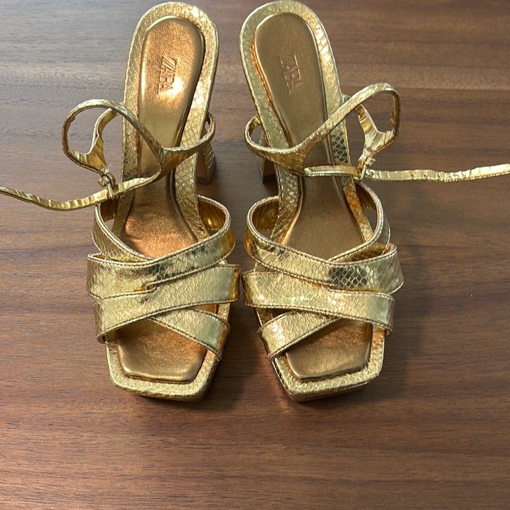 Golden metallic snakeskin platformrm heels